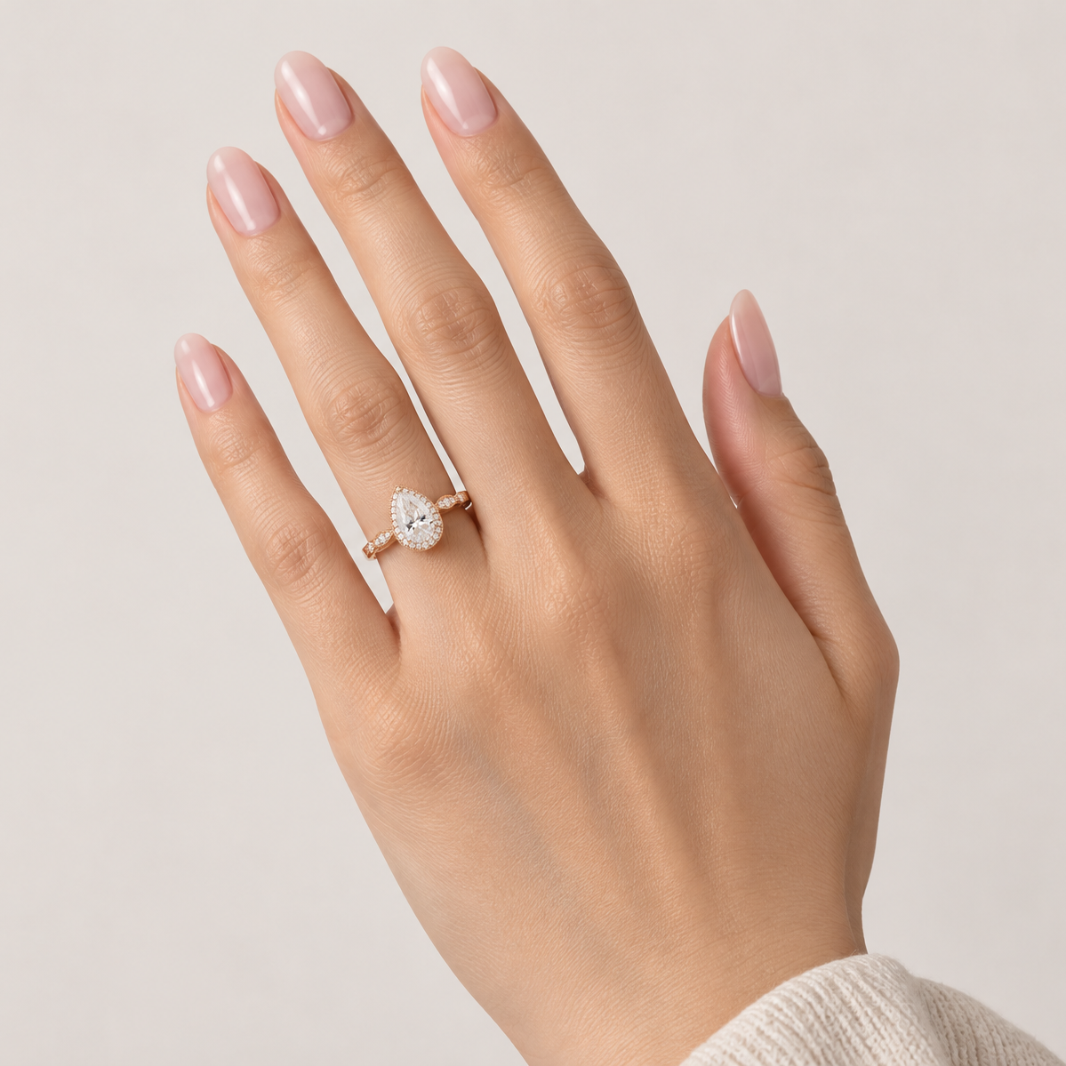Halo Pear Cut Colourless Moissanite Ring - Bella
