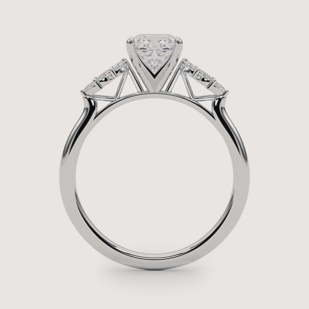 cushion-cut-diamond-nature-inspired-marquise-side-stone-engagement-ring-white-gold-side.jpg