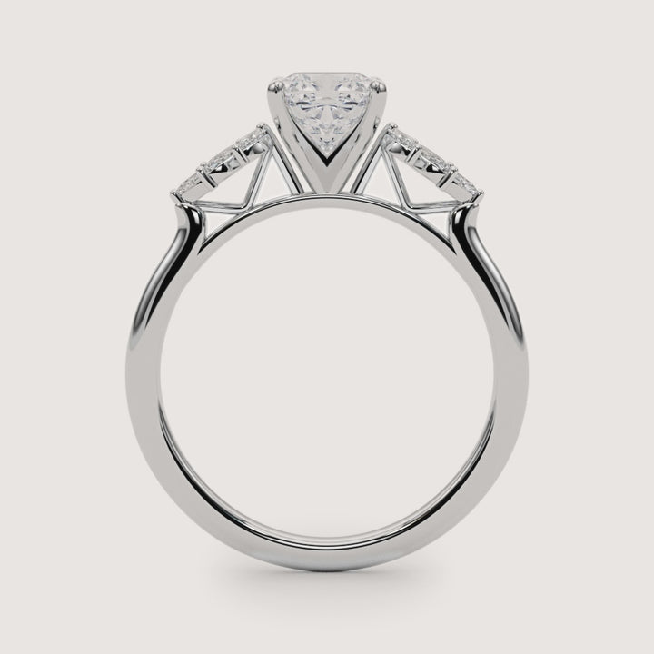 cushion-cut-diamond-nature-inspired-marquise-side-stone-engagement-ring-white-gold-side.jpg