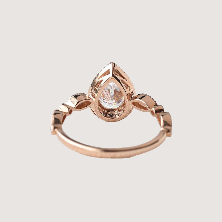 1.5ct Pear Cut Halo Colorless Moissanite Ring