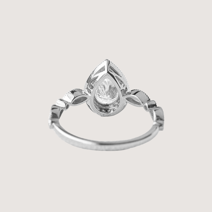 1.5ct Pear Cut Halo Colorless Moissanite Ring