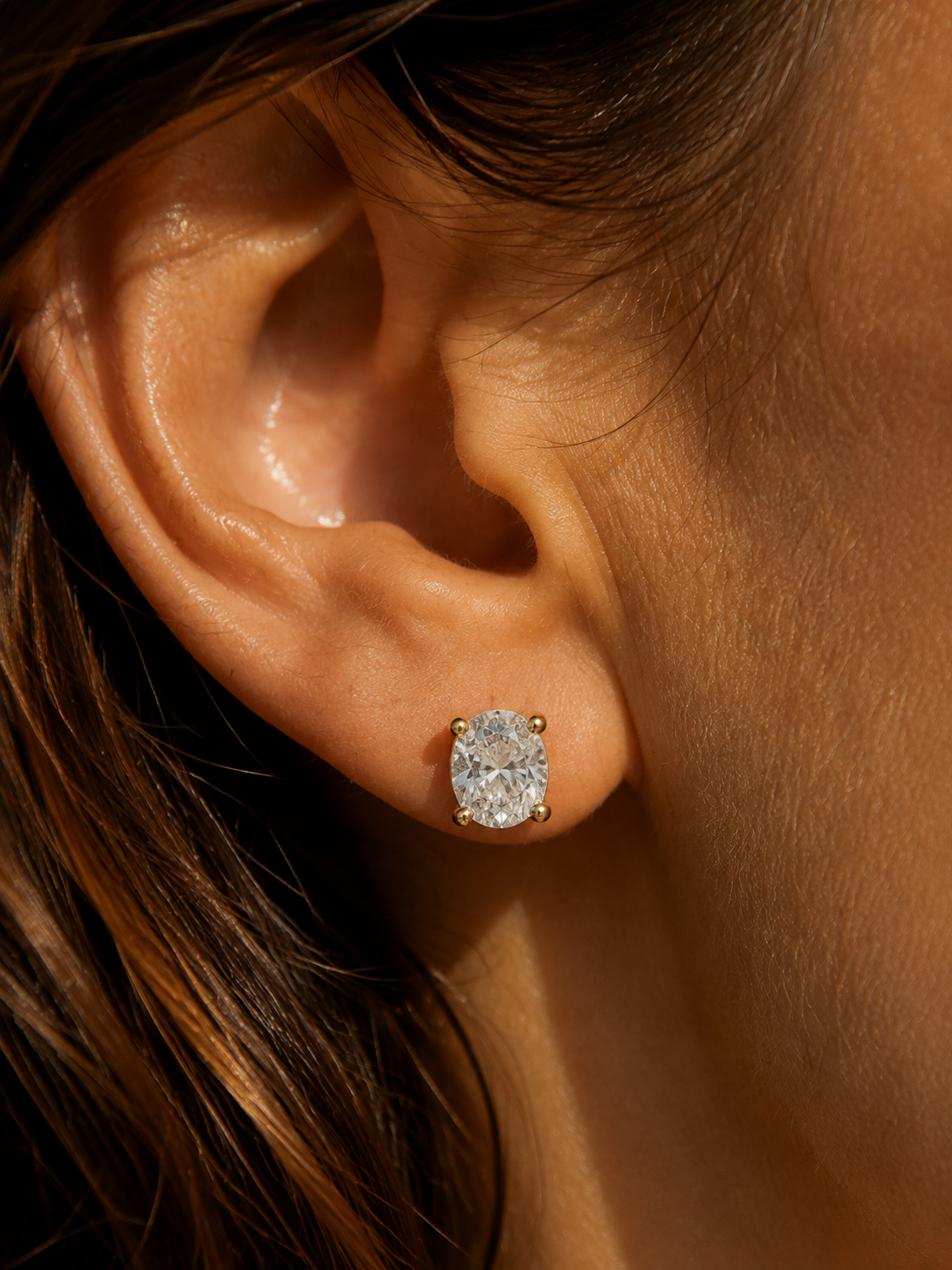 Gold pear diamond earrings